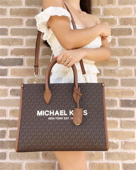 tote bag michael kors mirella|Michael Kors signature canvas tote.